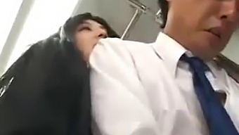 A Japanese Woman Gives A Handjob On A Public Bus