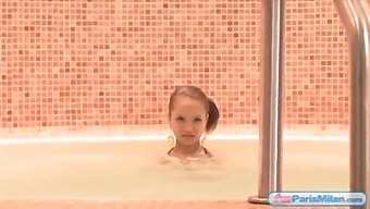Paris Milan, A Young Woman, Flaunts Her Body In A Bikini And Indulges In A Jacuzzi